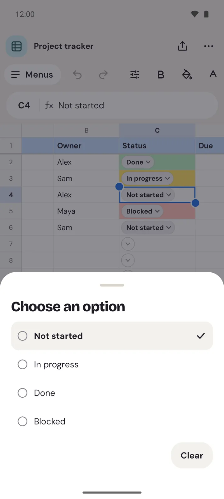 Choose an option on an Android phone, over a Project tracker sheet: Not started, In progress, Done and Blocked, with Clear